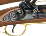 Closeup view of flintlock mechanism of Kentuciy Rifle.